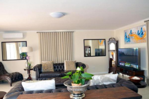 Spacious 4 BDR holiday home with mountain views ,pool and Solar backup